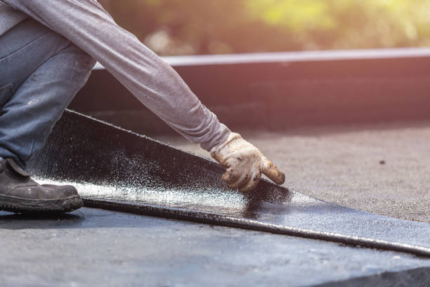 Professional Basement Waterproofing technician working in Royal Center, IN